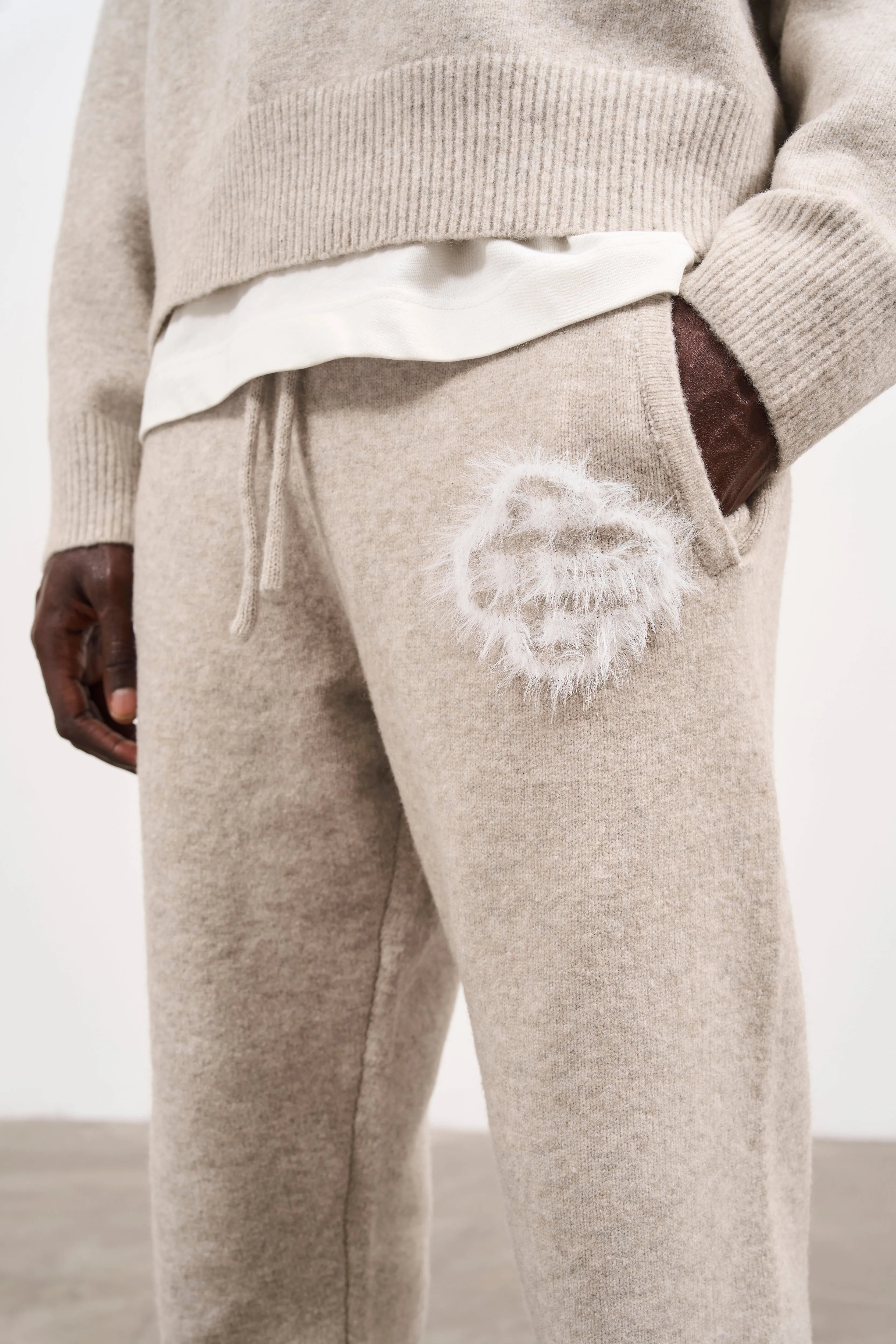 FLUFFY EMBLEM KNITTED JOGGERS - BEIGE sold by The Couture Club product image thumbnail 4
