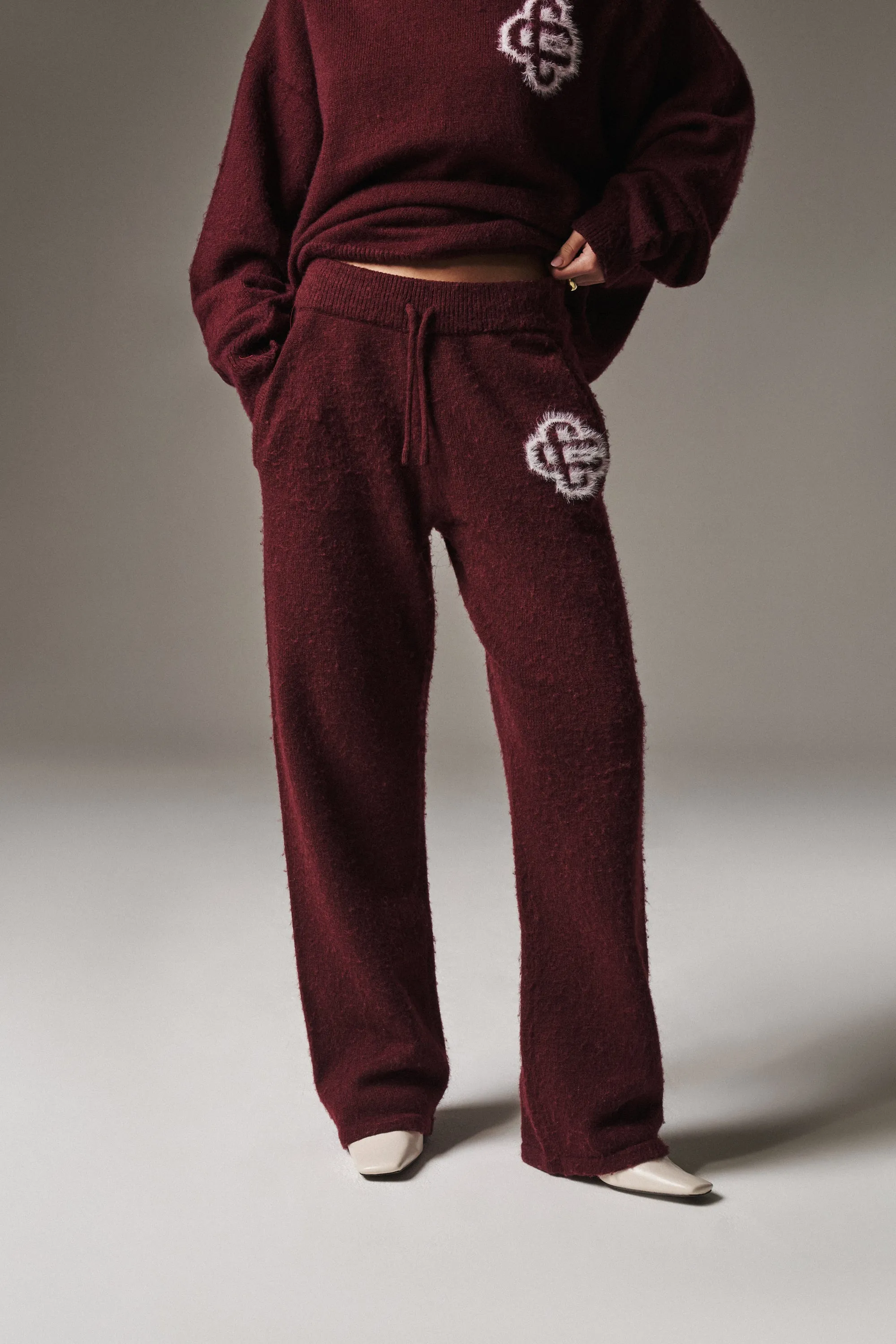 FLUFFY EMBLEM KNITTED JOGGERS - BURGUNDY sold by The Couture Club product image thumbnail 3