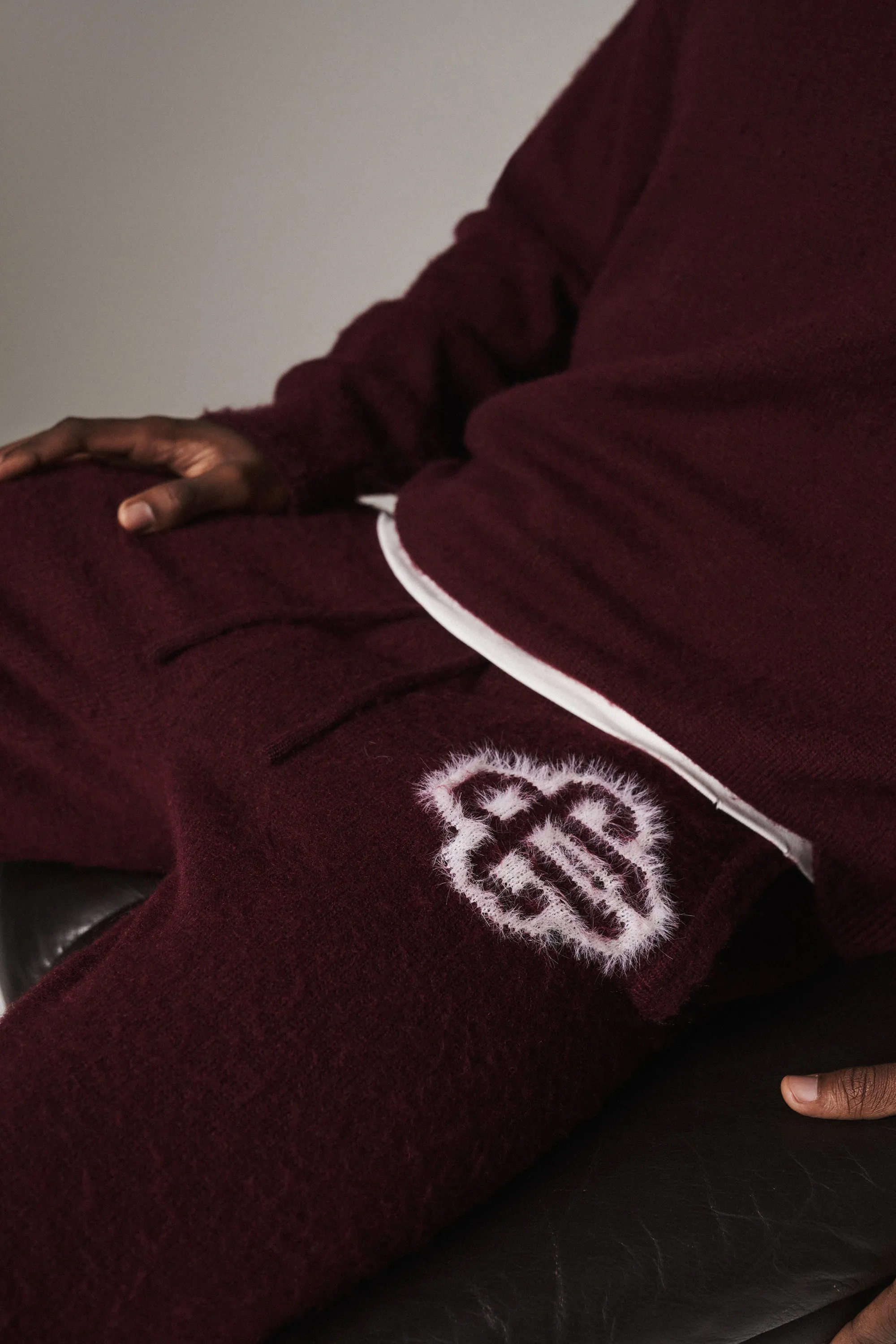 FLUFFY EMBLEM KNITTED JOGGERS - BURGUNDY sold by The Couture Club product image thumbnail 5