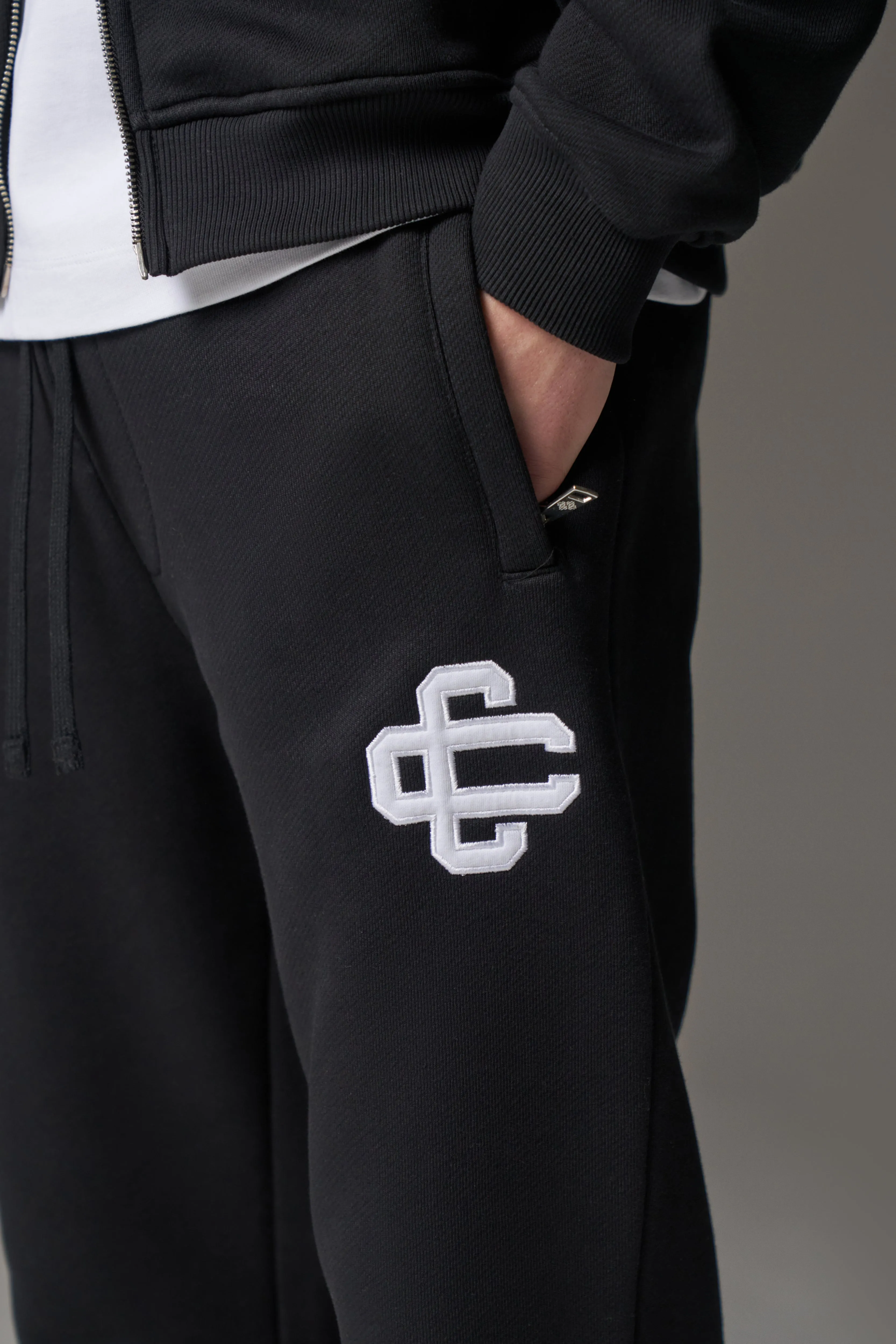 HEAVYWEIGHT EMBLEM APPLIQUE JOGGERS - BLACK sold by The Couture Club product image thumbnail 4
