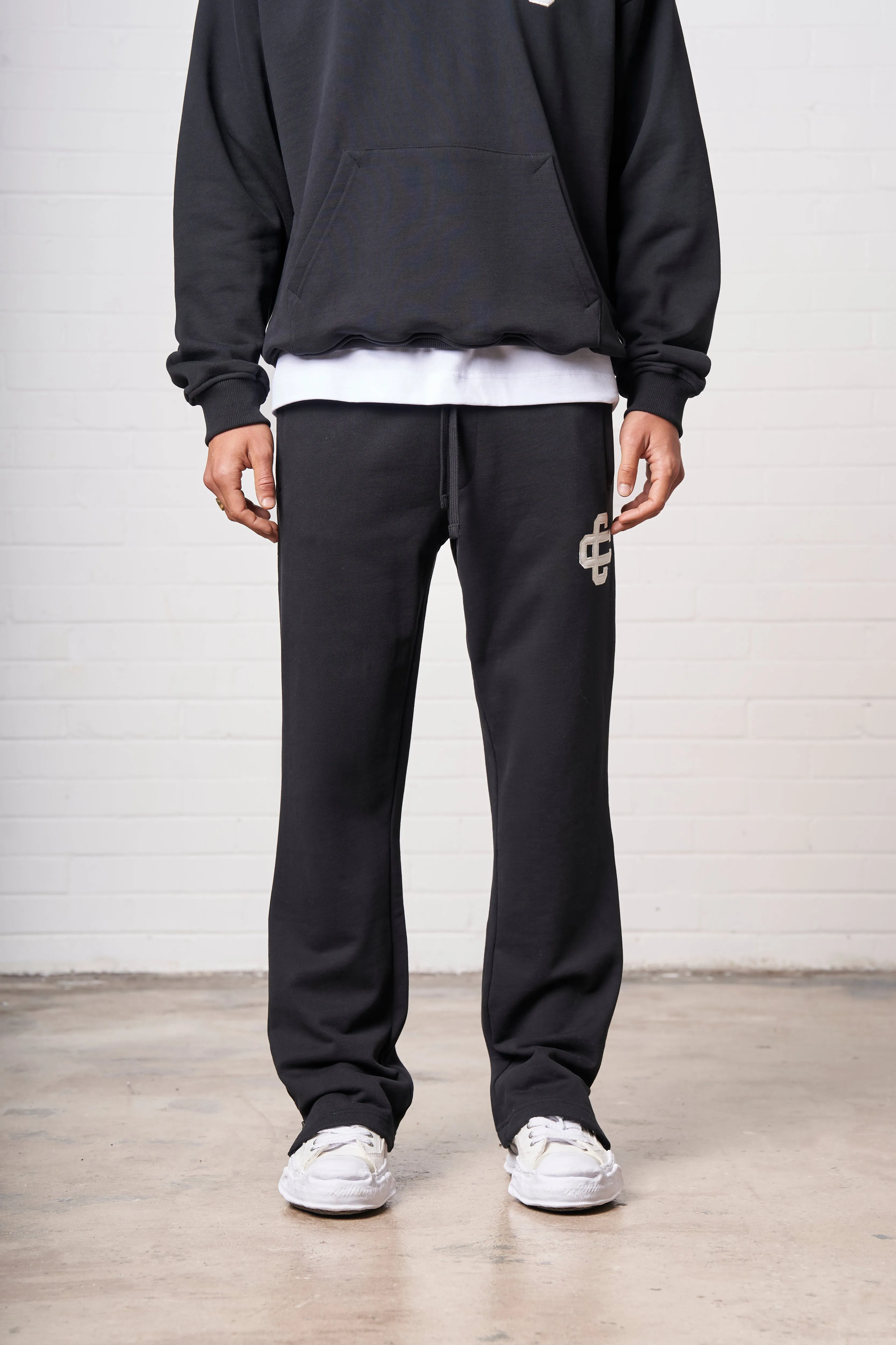 HEAVYWEIGHT APPLIQUE EMBLEM JOGGERS - BLACK sold by The Couture Club product image thumbnail 2