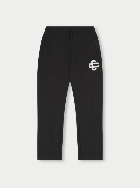 HEAVYWEIGHT APPLIQUE EMBLEM JOGGERS - BLACK sold by The Couture Club