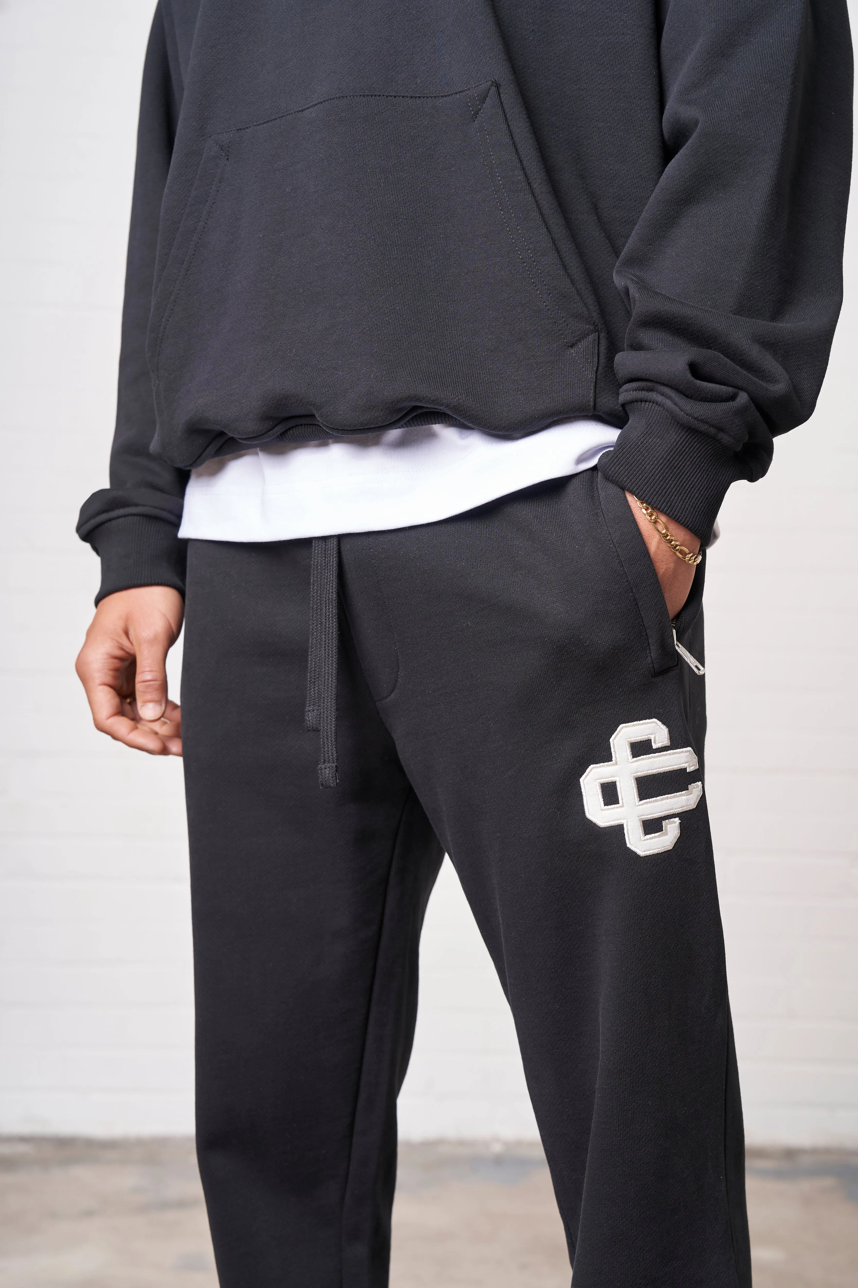 HEAVYWEIGHT APPLIQUE EMBLEM JOGGERS - BLACK sold by The Couture Club product image thumbnail 3