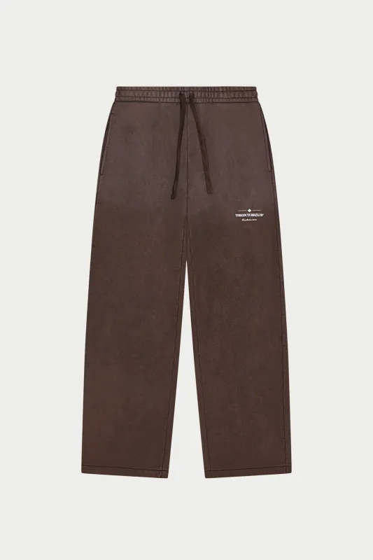 SPRAY WASH COPYRIGHT MULTI GRAPHIC JOGGERS - BROWN made by The Couture Club