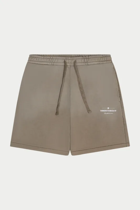 SPRAY WASH COPYRIGHT MULTI GRAPHIC SHORTS - BEIGE made by The Couture Club