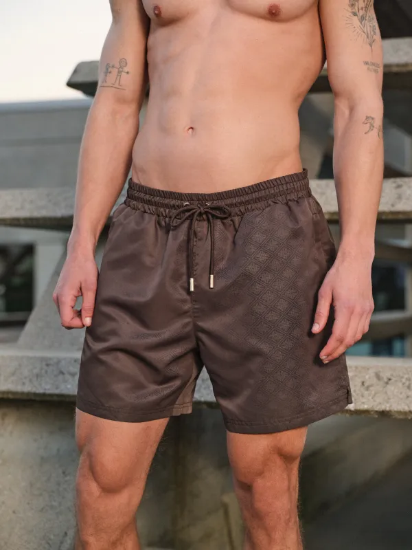 EMBLEM WATER REACTIVE SWIM SHORTS - BROWN made by The Couture Club