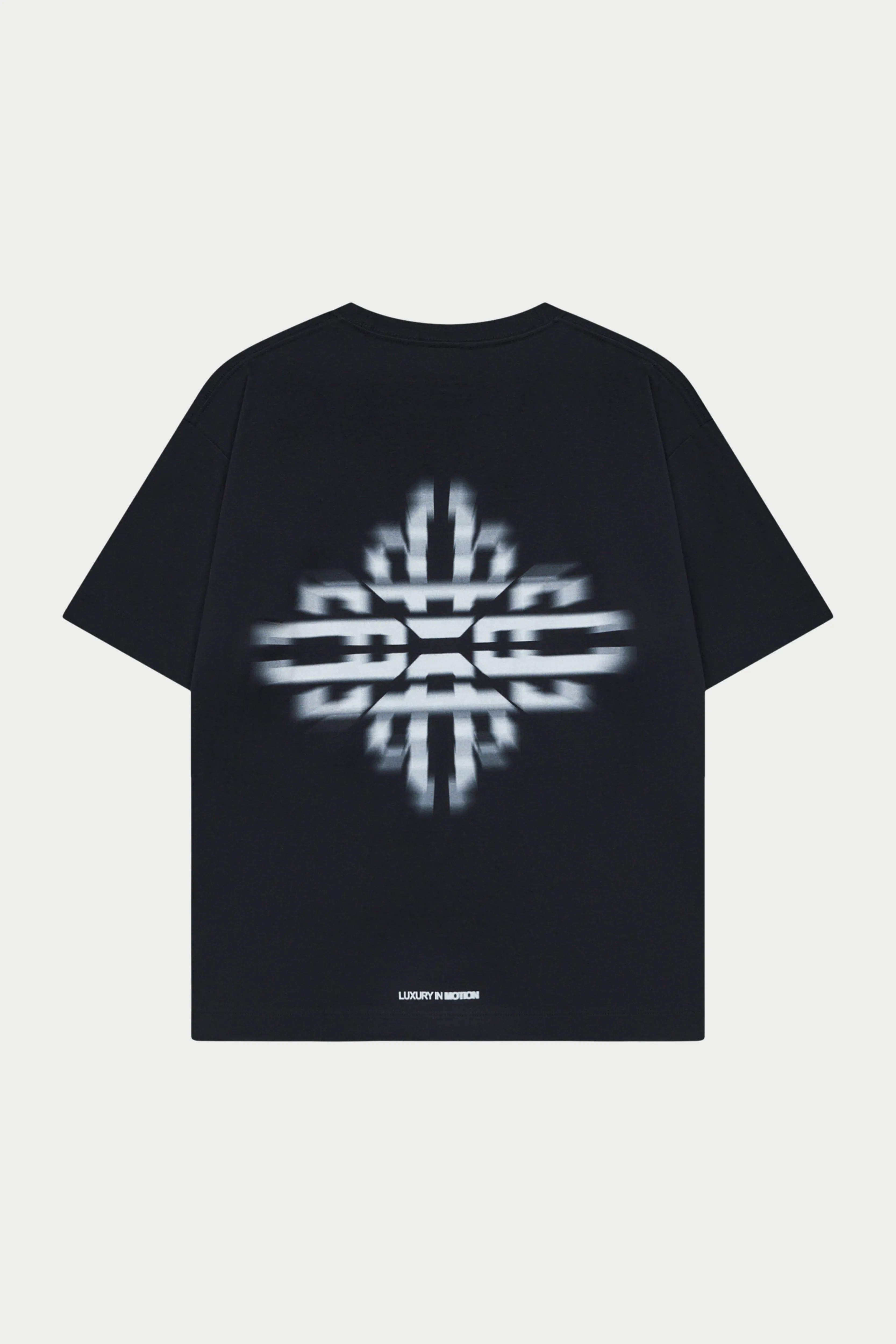 LUXURY IN MOTION GRAPHIC T-SHIRT - BLACK sold by The Couture Club
