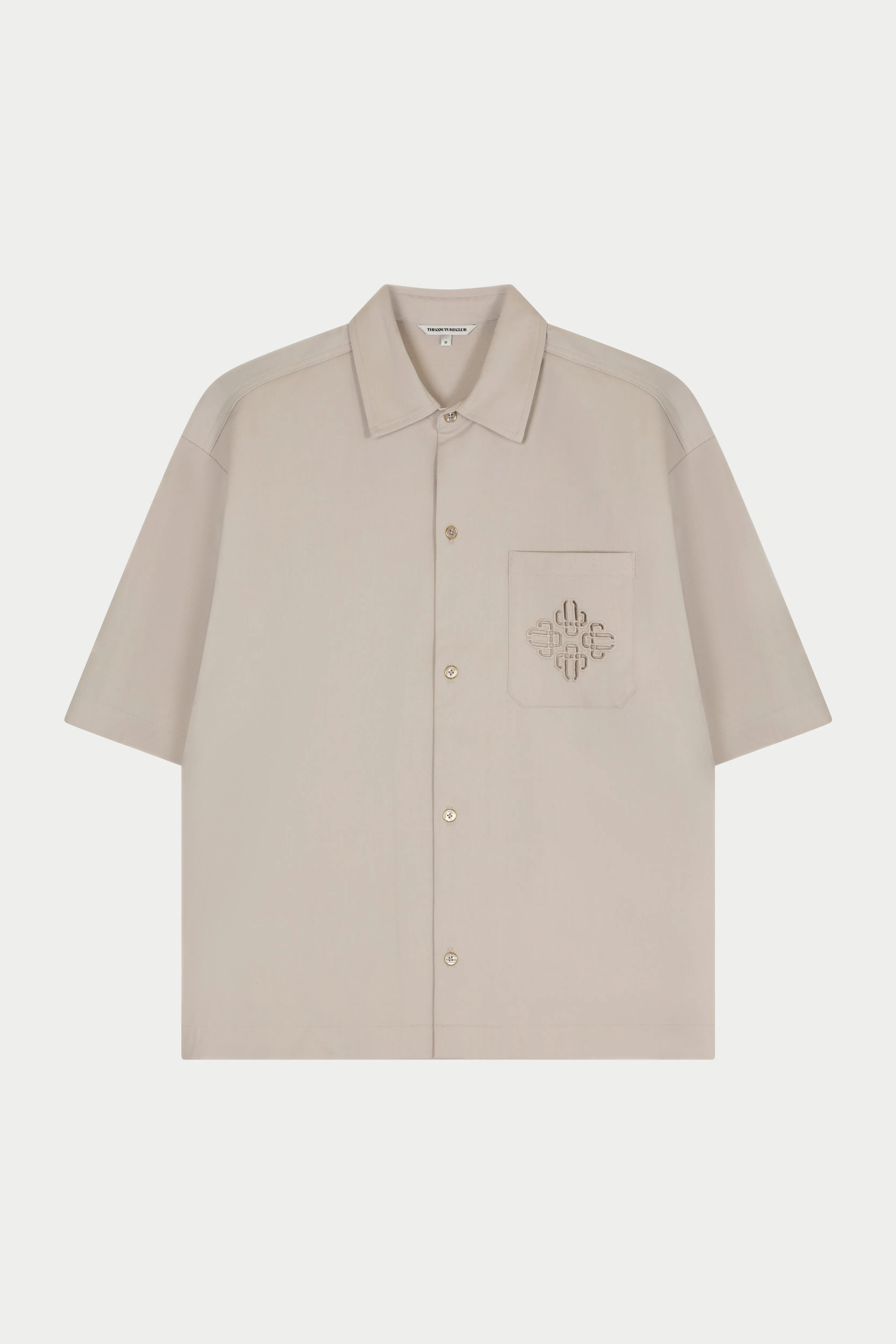 LASER CUT EMBLEM SHIRT - STONE sold by The Couture Club