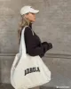 Varsity Tote Bag - Cream/Black sold by Adanola