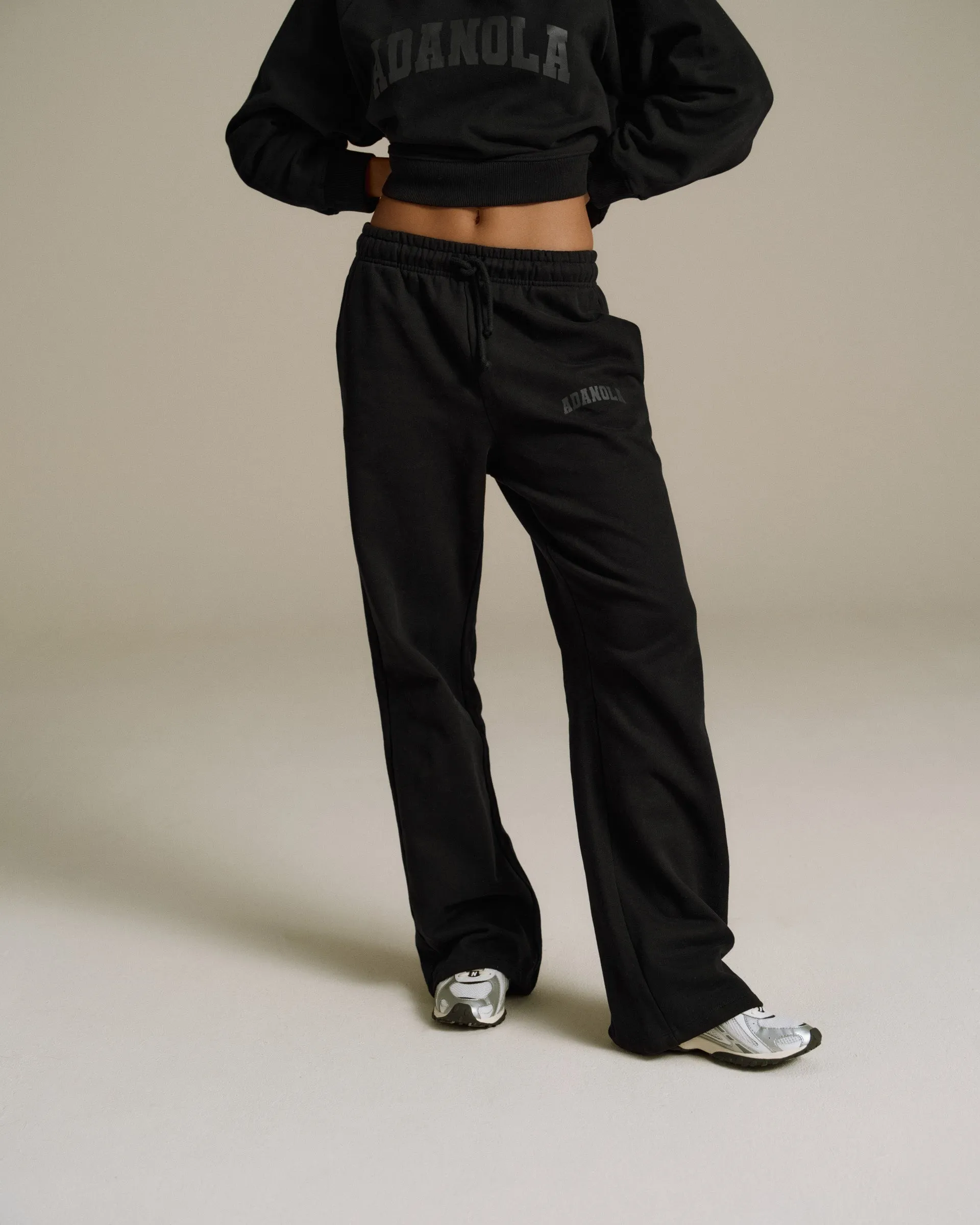 Varsity Loose Fit Straight Leg Sweatpants - Black sold by Adanola