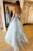 Oaklyn | Light Blue Appliques Off-the-Shoulder Ruffle Tiered Long Prom Dress sold by KissProm