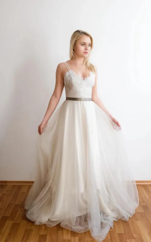 Romantic Long A-Line Tulle Wedding Dress With Spaghetti Straps And Lace Bodice sold by KissProm
