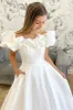 White Off-the-Shoulder Ruffle Long Bridal Gown sold by KissProm