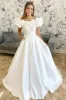 White Off-the-Shoulder Ruffle Long Bridal Gown sold by KissProm