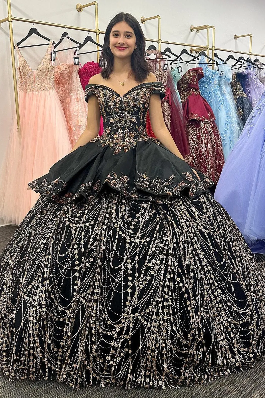 Black Satin Appliques Off-the-Shoulder Quinceanera Dress sold by KissProm