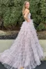 Polka Dot Strapless Ruffle Tiered Prom Gown with Keyholes sold by KissProm