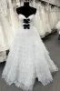 Polka Dot Strapless Ruffle Tiered Prom Gown with Keyholes sold by KissProm