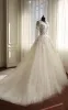 A-Line Long Sleeve Bell Beading Appliques Flower Zipper Keyhole Tulle Lace Dress sold by KissProm