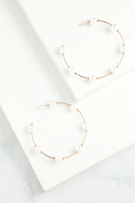 White Pearl Circle Earrings sold by KissProm