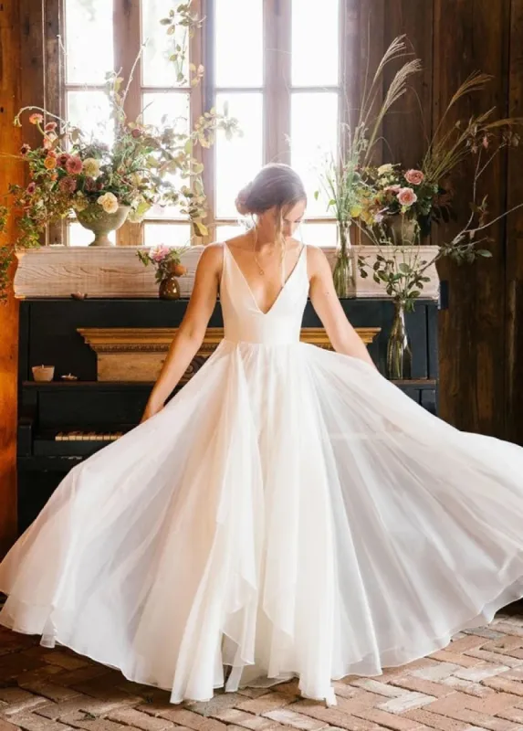 A Line Sleeveless Chiffon Deep V Neck Simple Long Beach Wedding Dress sold by KissProm