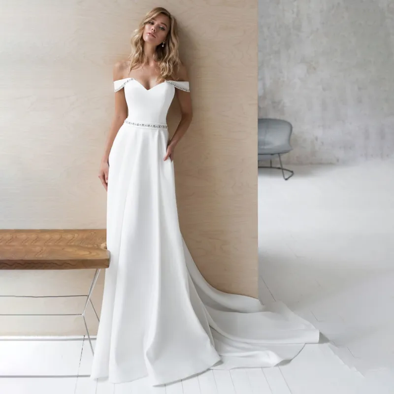 A-Line Off the Shoulder Beaded Wedding Dress sold by KissProm