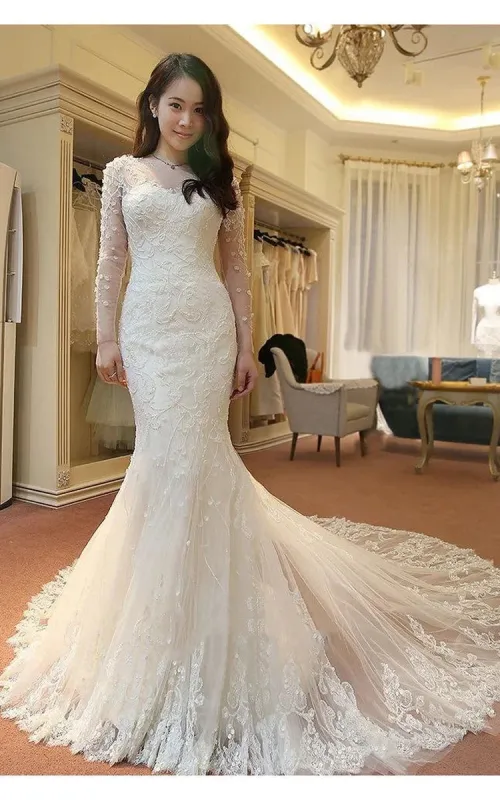 Stunning Long Sleeve Lace Appliques Mermaid Wedding Dresses with Train sold by KissProm