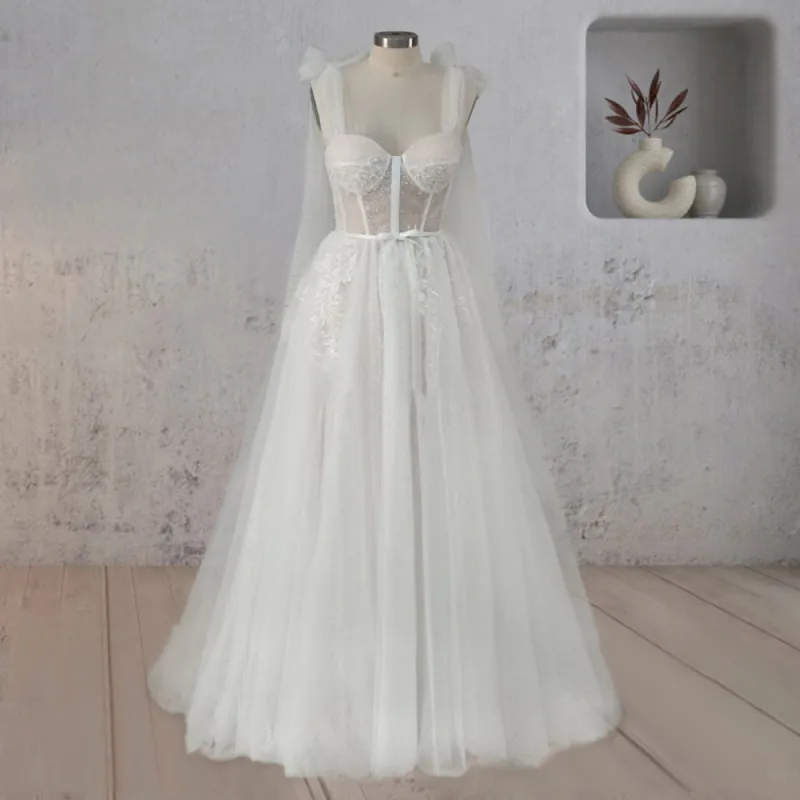 A-Line White Tulle Lace Flattering Wedding Dress With Slit sold by KissProm