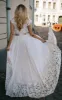 A Line Bateau Chiffon and Lace Floor-length Short Sleeve Wedding Dress with Ribbon sold by KissProm