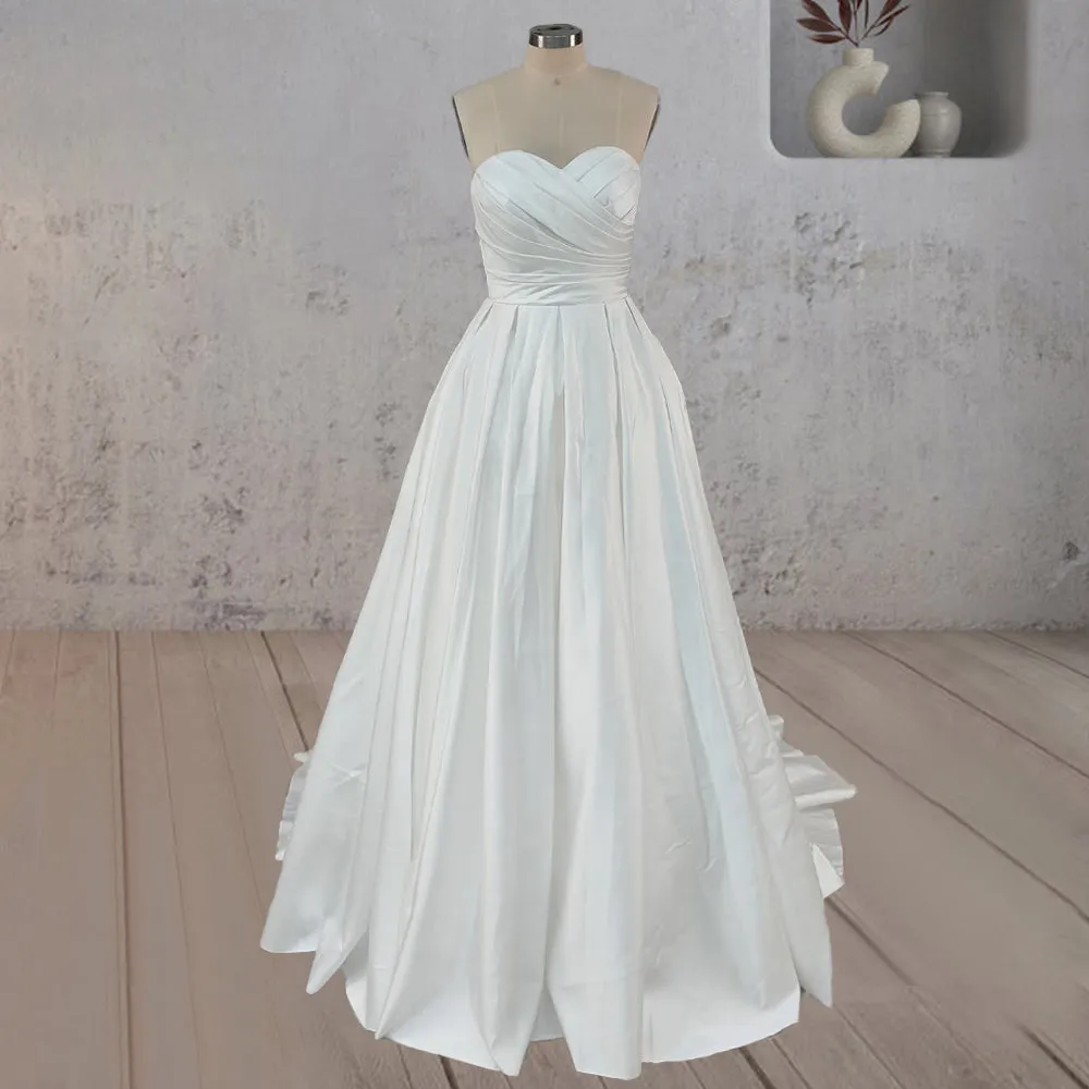 A-Line White Strapless Ruffled Wedding Dresses sold by KissProm