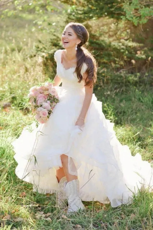 V-neck Ruffles Tiered Skirt A-line Lace Organza Wedding Dress with Cap Sleeves sold by KissProm