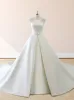 White Satin Cap Sleeve Lace-Up Wedding Dress With Pearls sold by KissProm