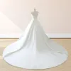 White Satin Cap Sleeve Lace-Up Wedding Dress With Pearls sold by KissProm