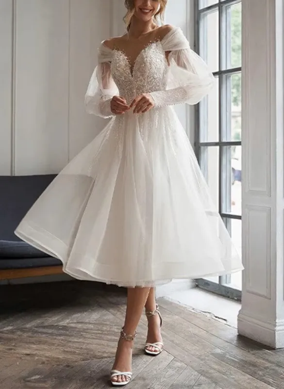 A-Line Sweetheart Long Sleeves Elegant Tulle Wedding Dresses With Appliques Lace sold by KissProm