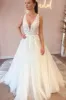 Elegant A Line V Neck Tulle Wedding Dresses with Appliques sold by KissProm