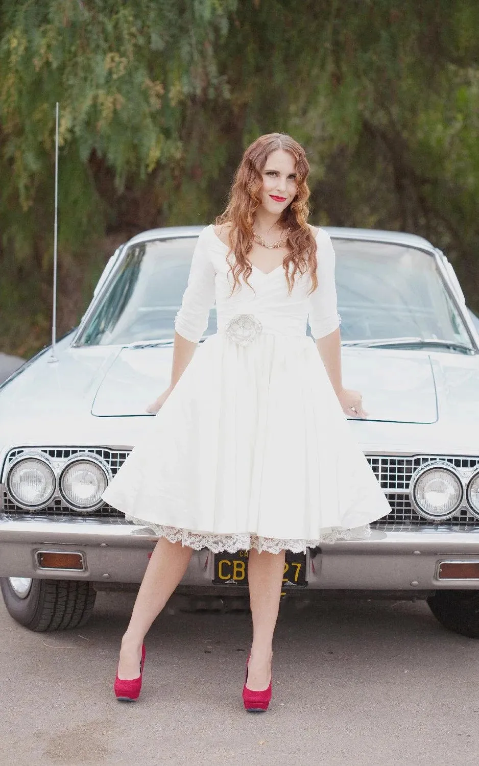 Knee Length Wedding Dress With 3/4 Sleeves sold by KissProm