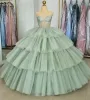 Sage Green Luxury Tiered Tulle Ruffles Beaded Ball Gown Quinceanera Dress sold by KissProm