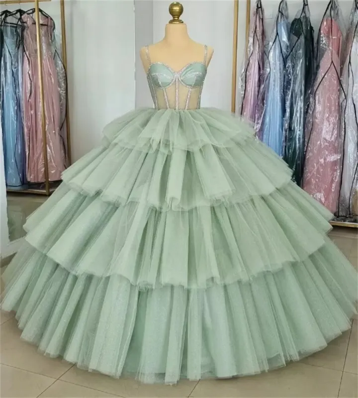 Sage Green  Luxury Tiered Tulle Ruffles Beaded Ball Gown Quinceanera Dress sold by KissProm