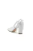 White Mesh Pump with Elegant Bow Detail and Transparent Overlay sold by KissProm