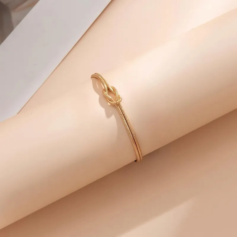 Gold Love Knot Snake Chain Bracelets sold by KissProm