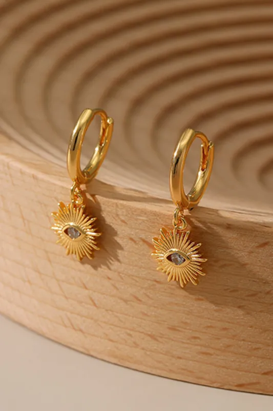 Gold Sun Eyes Hoop Earrings sold by KissProm