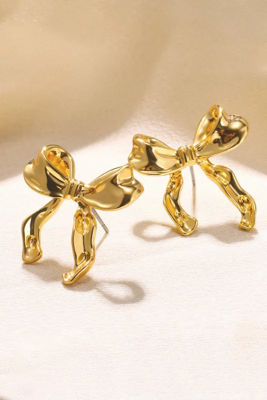 Gold Bow Ribbon Stud Earrings sold by KissProm