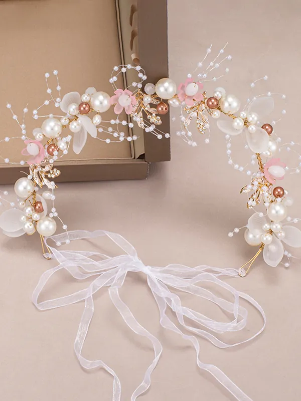 The Bride Flower Girl Leaf Pearl Headband sold by KissProm