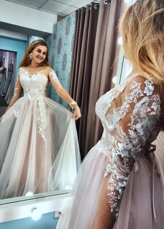 A Line Long Sleeves Blushing Pink Lining Wedding Dress With Lace Appliques sold by KissProm