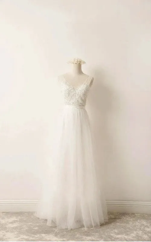 A-Line Tulle Lace V Neck Wedding Dress With Sweep Train made by KissProm