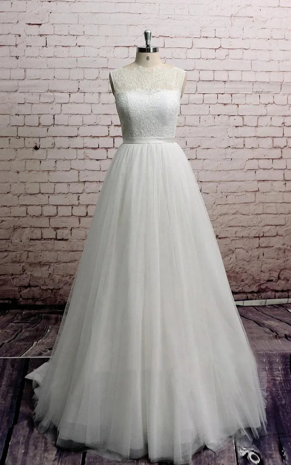 Princess Sleeveless A-Line Tulle Long Wedding Dress With Sash sold by KissProm