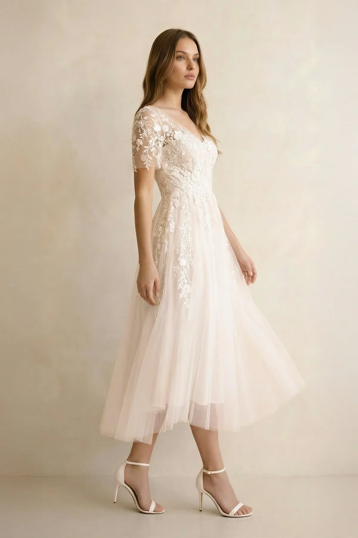 A Line V Neck Tulle Wedding Dress With Appliques in Ivory sold by KissProm product image thumbnail 3