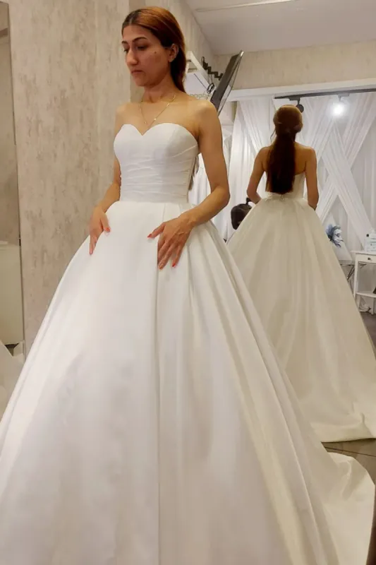 Ivory Satin Sweetheart A-Line Sleeveless Wedding Dress sold by KissProm