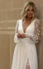 Long Sleeve Boho Flowy Wedding Dress Lace A-Line V-Neck Beach Gown with Split Front and Sweep Train sold by KissProm
