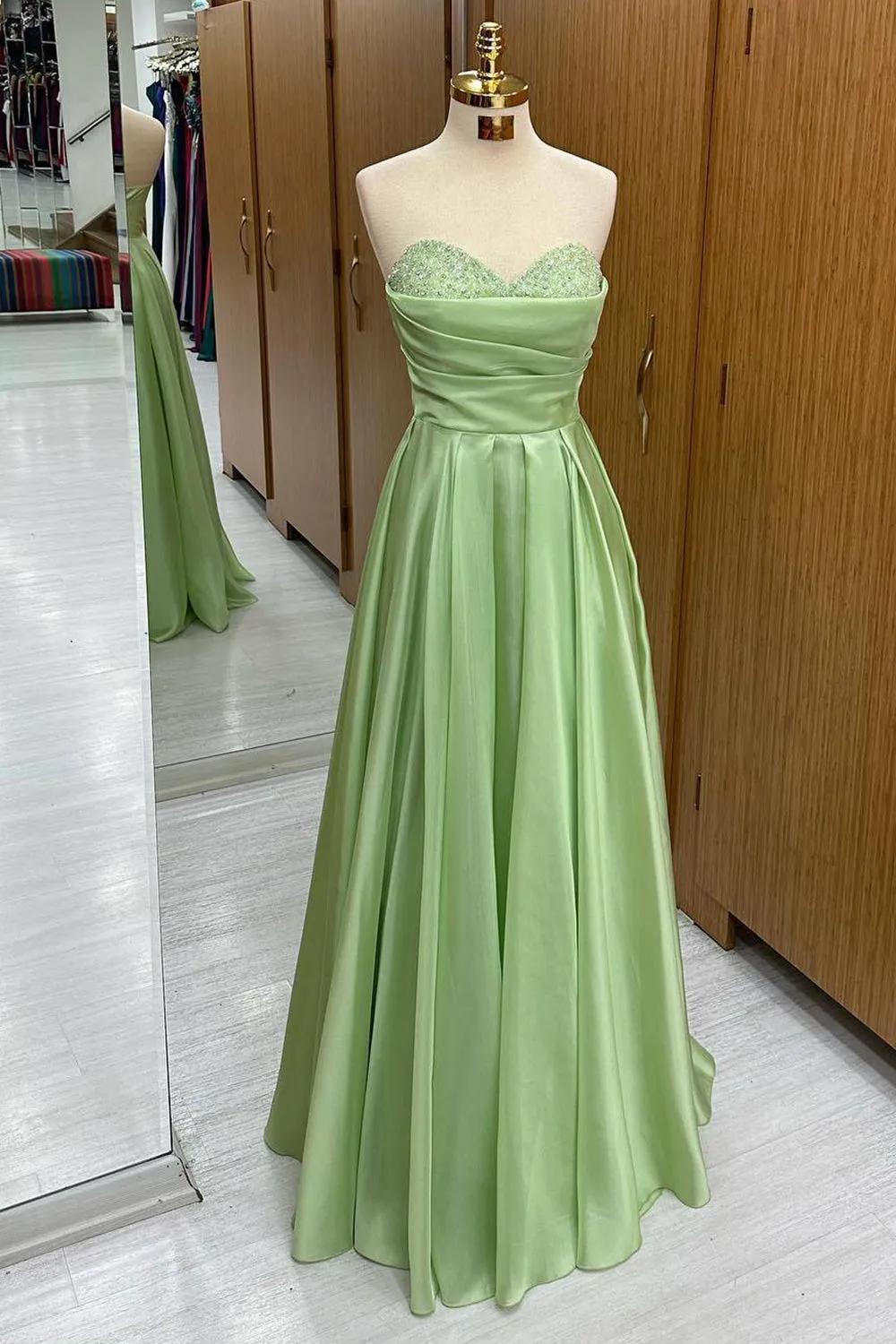 Green Sweetheart Long Sequined Prom Dress sold by KissProm