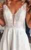 Sansa | Plunging Neckline A-Line Satin Wedding Dress With Low-V Back And Appliques sold by KissProm